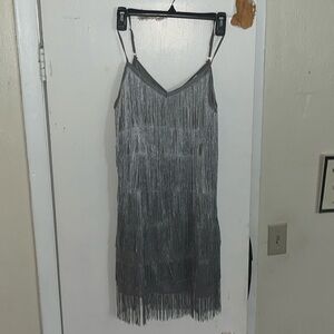 Hi I’m selling this gorgeous Silver Fringe dress perfect for parties & concerts!